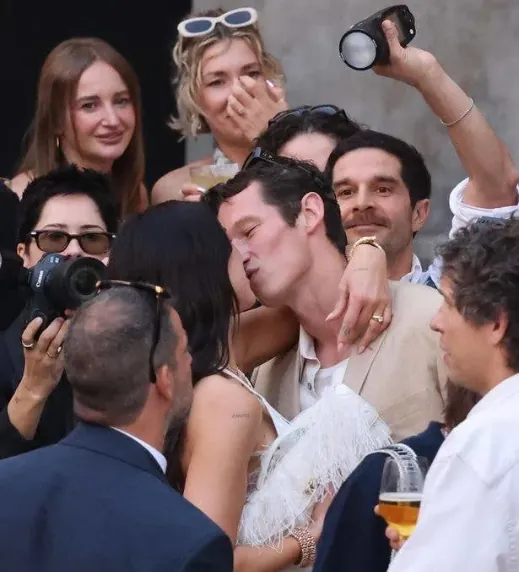 Dua Lipa and Callum Turner Wedding Moment